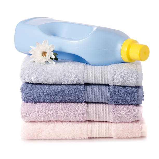 istock A stack set of towels pink blue flower bottle for liquid laundry 930571232