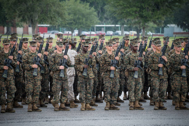 Parris Island, South Carolina, USA - September 23, 2014: As rain falls, recruits undergo basic training at Marine Corps Recruit Depot Parris Island in South Carolina