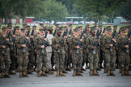 Parris Island, South Carolina, USA - September 23, 2014: As rain falls, recruits undergo basic training at Marine Corps Recruit Depot Parris Island in South Carolina