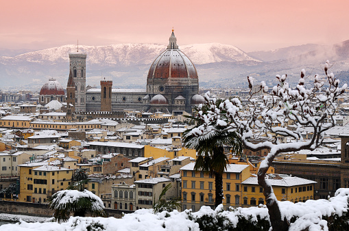 Cathedral of Santa Maria del Fiore in Florence after a big snowfall, as seen from Piazzale Michelangelo. Italy.