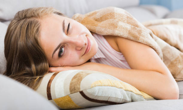 istock Girl lying with one closed eye 930574222