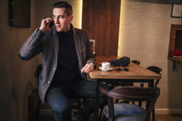 istock Handsome man talking over the phone 930574896