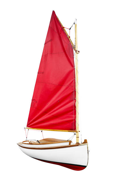 Sailboat with red scarlet sail  isolated on a white background.