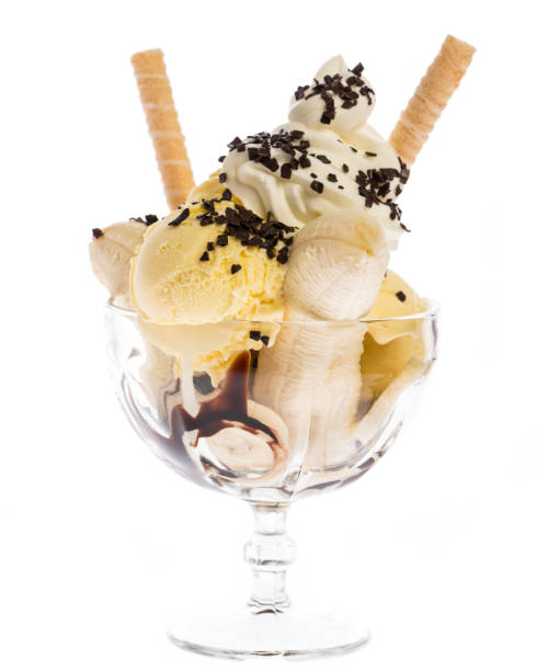 istock banana ice cream sundae with cream and waffles 930575328