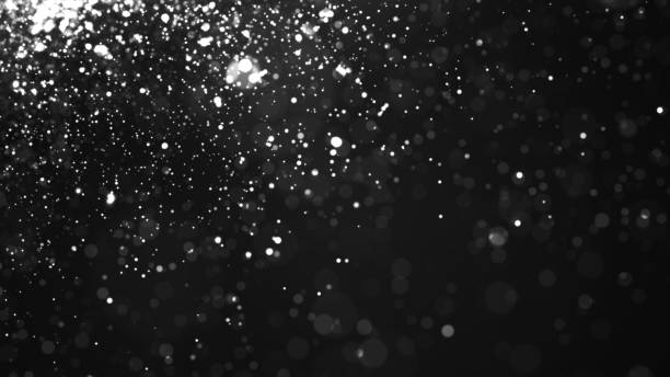 istock glowing particles, stars and sparkling flow 930579036