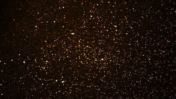 istock glowing particles, stars and sparkling flow 930579086