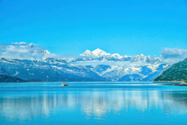 Covering 3.3 million acres of rugged mountains, dynamic glaciers, temperate rainforest, wild coastlines and deep sheltered fjords, Glacier Bay National Park is a highlight of Alaska's Inside Passage and part of a 25-million acre World Heritage Site—one of the world's largest international protected areas.