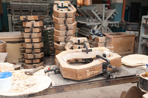 factory for the production of bent wood products. Tools for processing and gluing. Manufacture of guitars and stringed musical instruments.