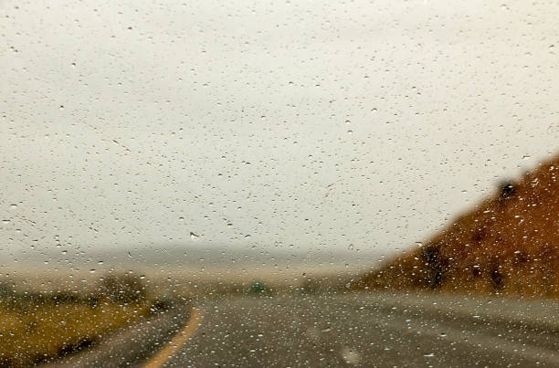 Road travel on a rainy day Scenic roads captured during storms in Arizona marie puddu stock pictures, royalty-free photos & images