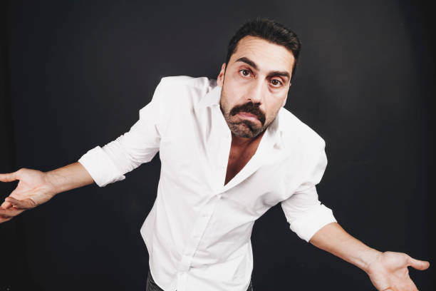 istock Young handsome man with beard and mustache studio portrait 930597604
