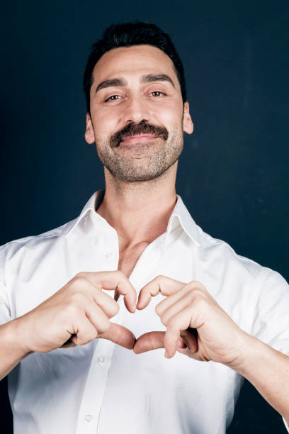 istock Young handsome man with beard and mustache studio portrait 930597628
