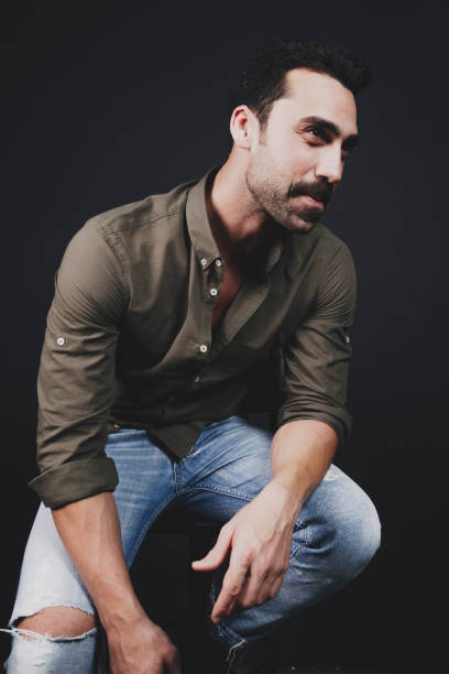 istock Young handsome man with beard and mustache studio portrait 930597684