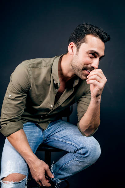 istock Young handsome man with beard and mustache studio portrait 930597692