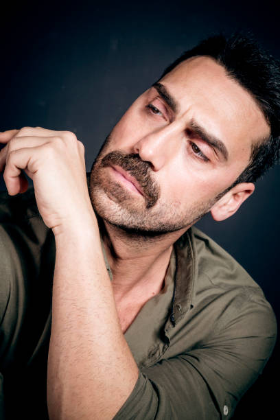istock Young handsome man with beard and mustache studio portrait 930597706