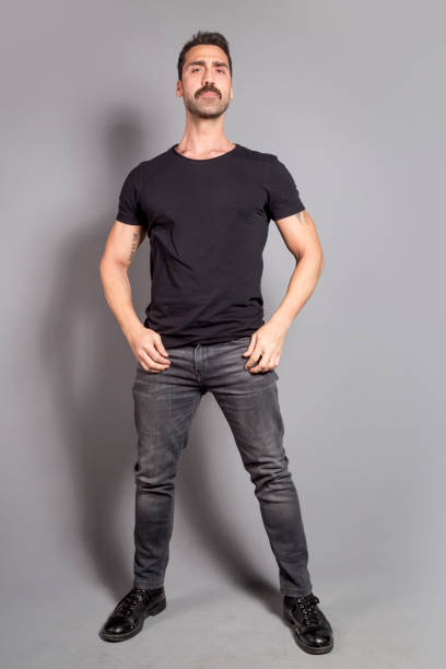 istock Young handsome man with beard and mustache studio portrait 930597792