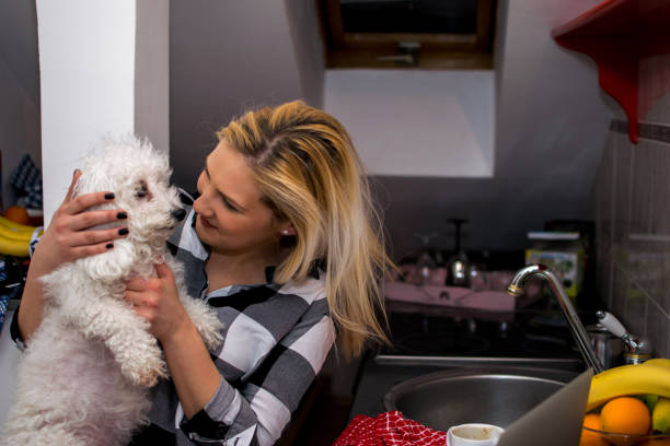 istock Woman and her dog 930604344