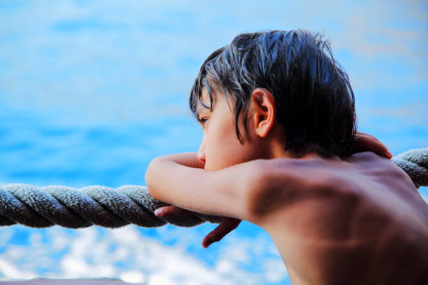 Young girl on holiday by the sea