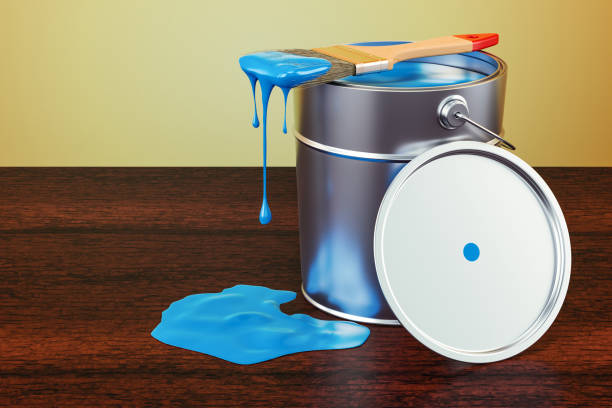 istock Can with blue paint and brush on the wooden table. 3D rendering 930608600