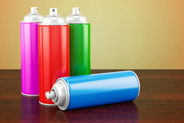istock Spray paint cans on the wooden table. 3D rendering 930608702