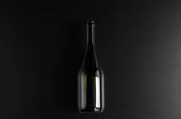 istock empty bottle of champagne on a black background 930611580