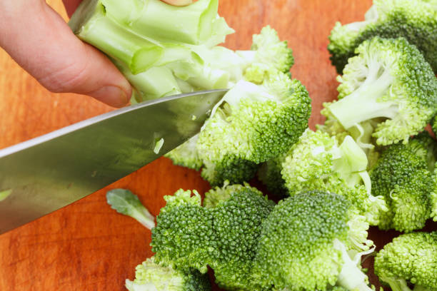 istock Brocolli salad cooking wooden bacground.. 930622738