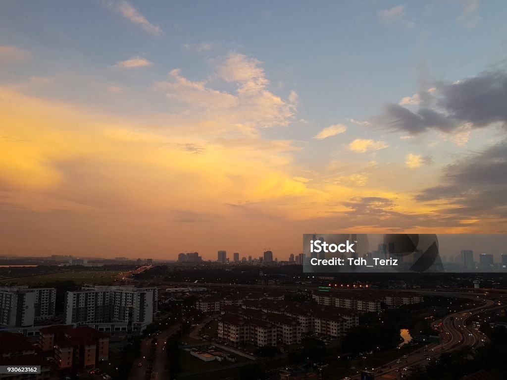 Sunset over cityscape Aerial view of sunset over cityscape of Johor Bahru, Malaysia Malaysia Stock Photo