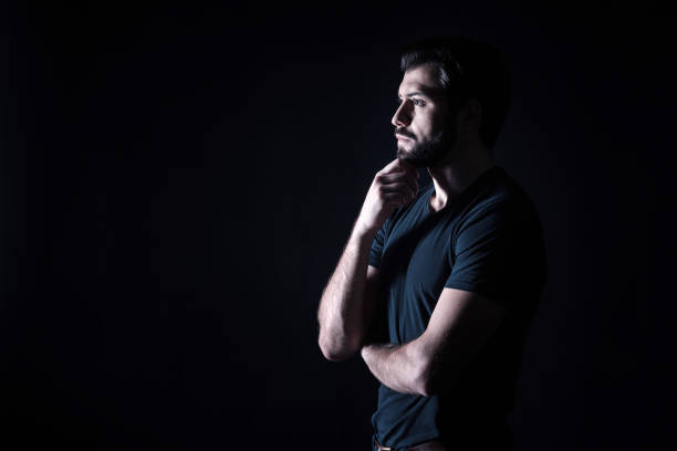 istock Nice thoughtful man holding his chin 930626264