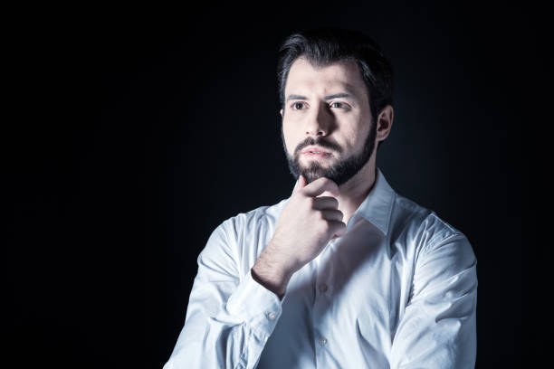 istock Pleasant handsome man looking in front of him 930626426