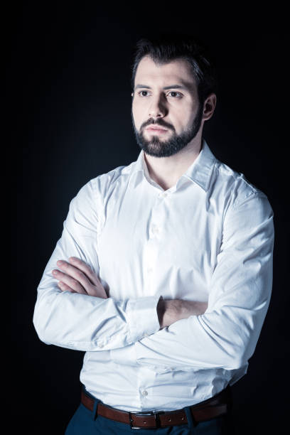 istock Serious confident man standing cross handed 930626454
