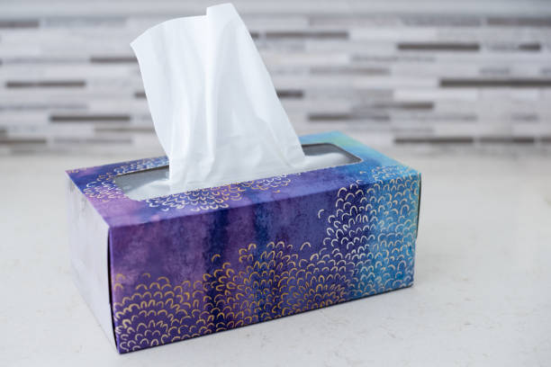 Box of Tissues box of tissues on counter in bathroom ready for cold and flu season facial tissue photos stock pictures, royalty-free photos & images
