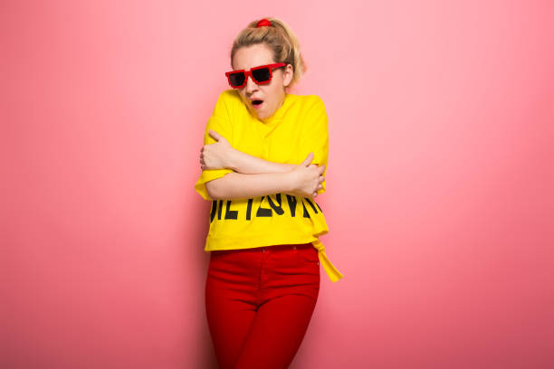 istock Blonde woman in bright clothes 930658066
