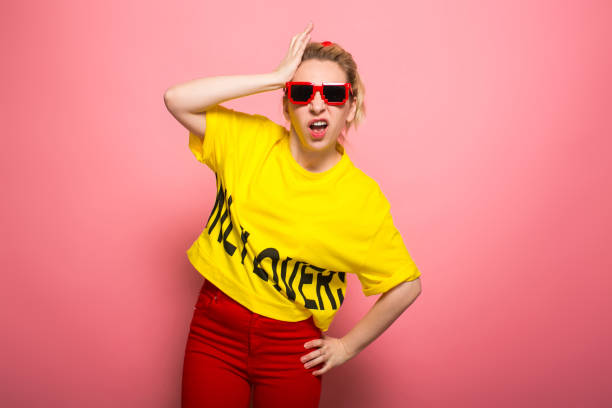 istock Blonde woman in bright clothes 930658080