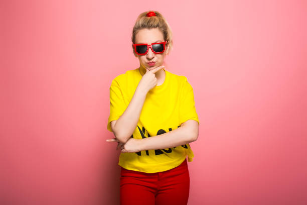 istock Blonde woman in bright clothes 930658082