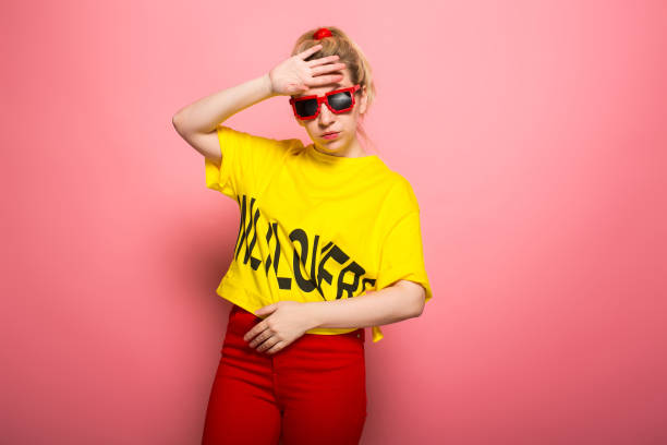 istock Blonde woman in bright clothes 930658096