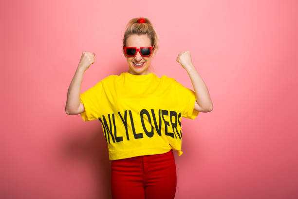 istock Blonde woman in bright clothes 930658114