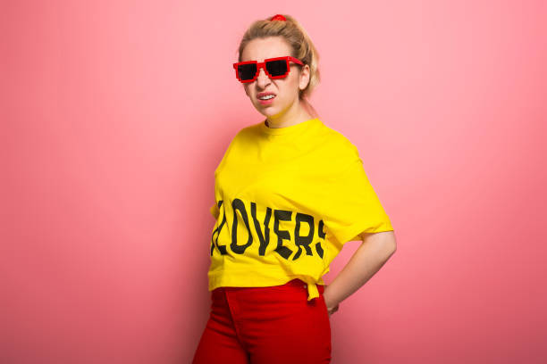 istock Blonde woman in bright clothes 930658118