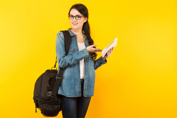 istock Young woman with bag and pc 930658158