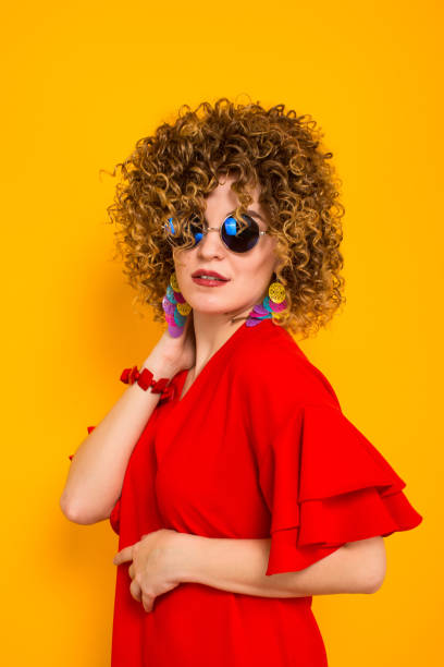 istock Attractive woman with short curly hair 930658466