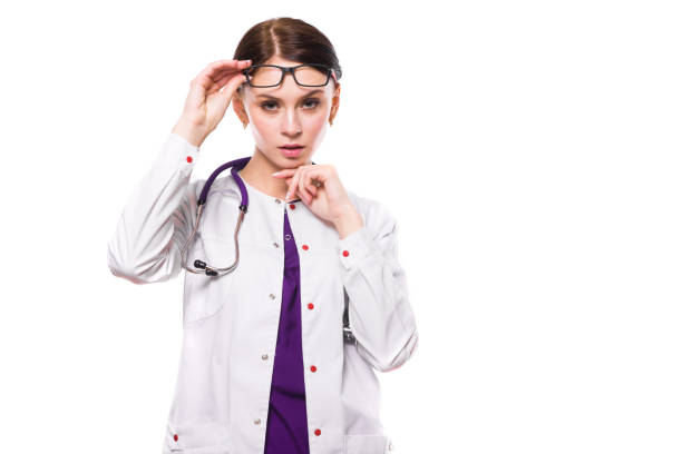istock Young beautiful female doctor with raised glasses on white background 930659002