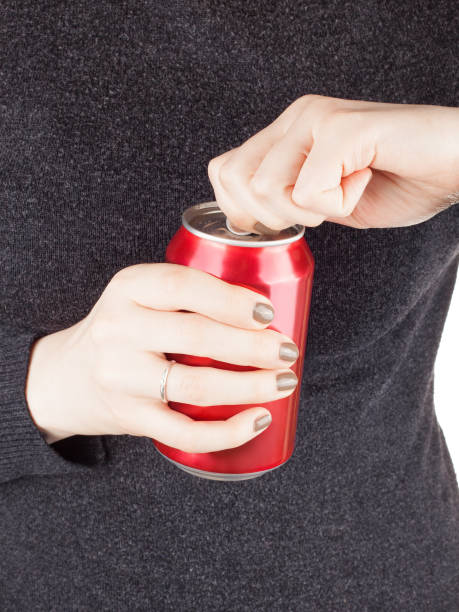 istock Female opening a can of soda 930665150