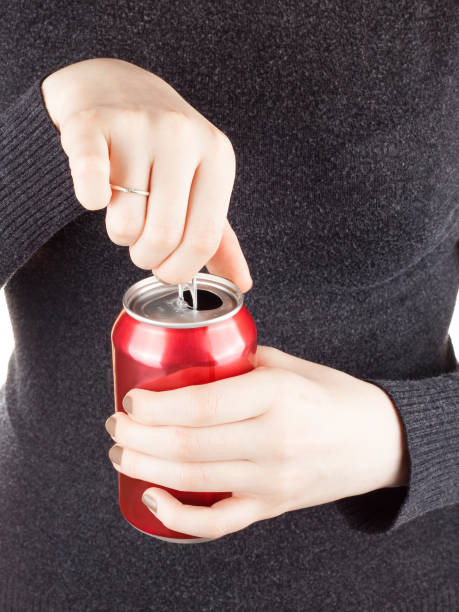 istock Female opening a can of soda 930665152