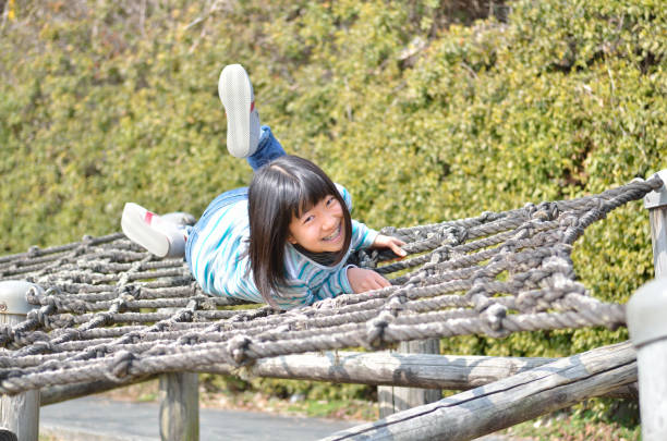 istock Girl's playing in the park 930672320