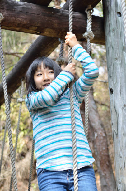 istock Girl's playing in the park 930672440