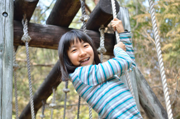istock Girl's playing in the park 930672446