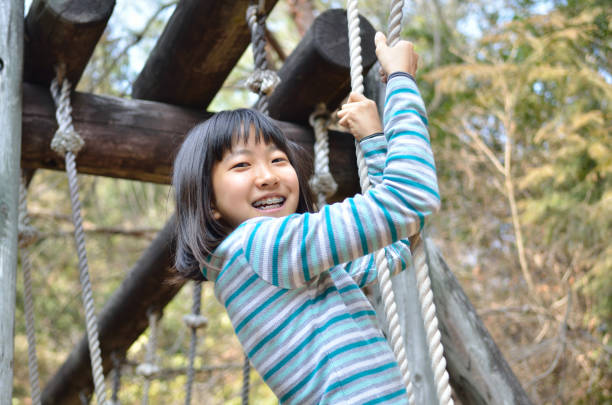 istock Girl's playing in the park 930672448