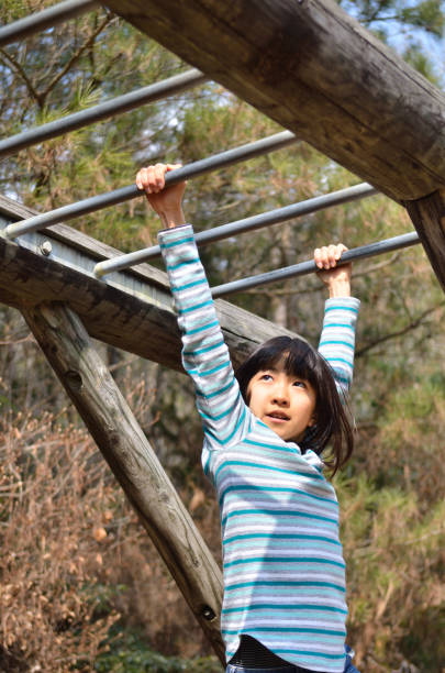 istock Girl's playing in the park 930672476