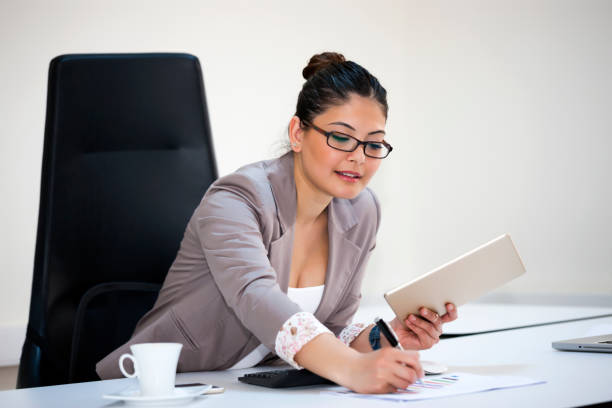 istock Busy Businesswoman working in office 930684214