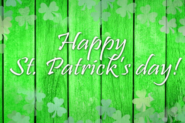 istock Happy St. Patrick's Day note on a wooden texture 930689492