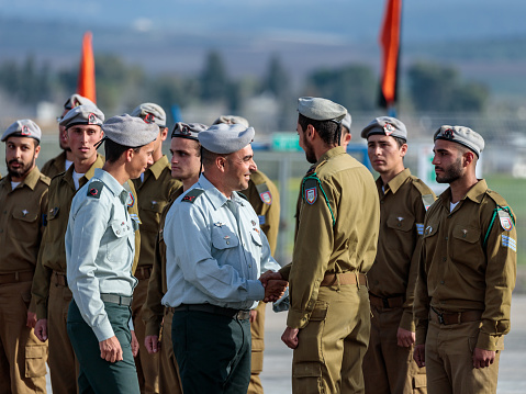 Mishmar David, Israel, Februar 21, 2018 : Officers of the IDF talk with a soldier during the formation in Engineering Corps Fallen Memorial Monument in Mishmar David, Israel