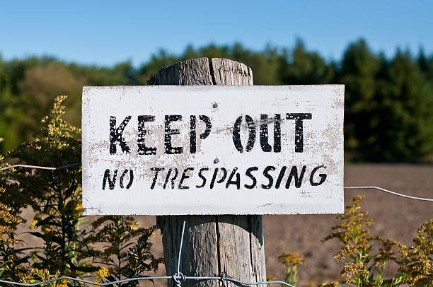 istock Keep Out Sign Nailed to a Fencepost 93069538